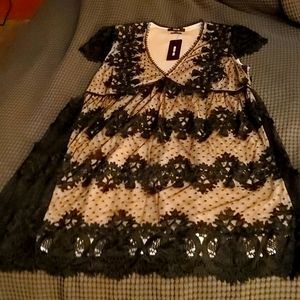 Womens Black Lace dress with a underskirt. Size Medium. Brand New With Tags